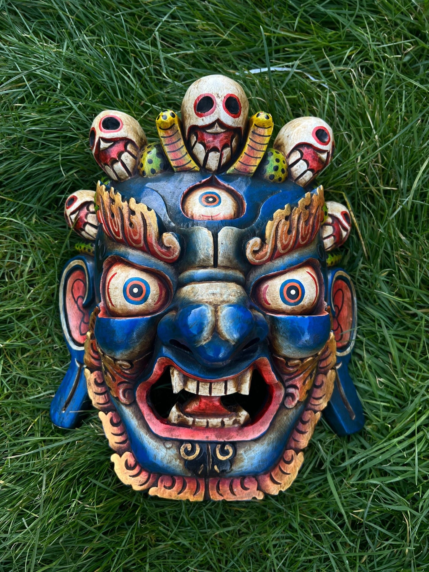 Hand-carved Mahakala Bhairava wooden mask, traditional Nepalese deity wall hanging, hand-painted spiritual home decor.